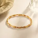 There's nothing quite like a gold-plated bamboo bangle 💜.webp